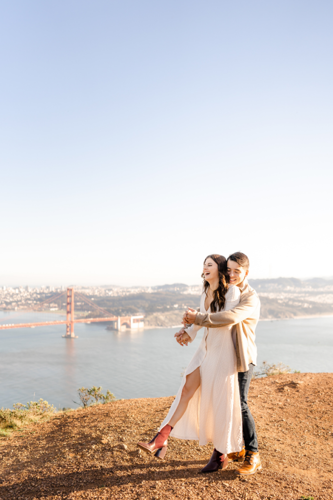 Couple hugging each other during Marin Headlands Engagement Session