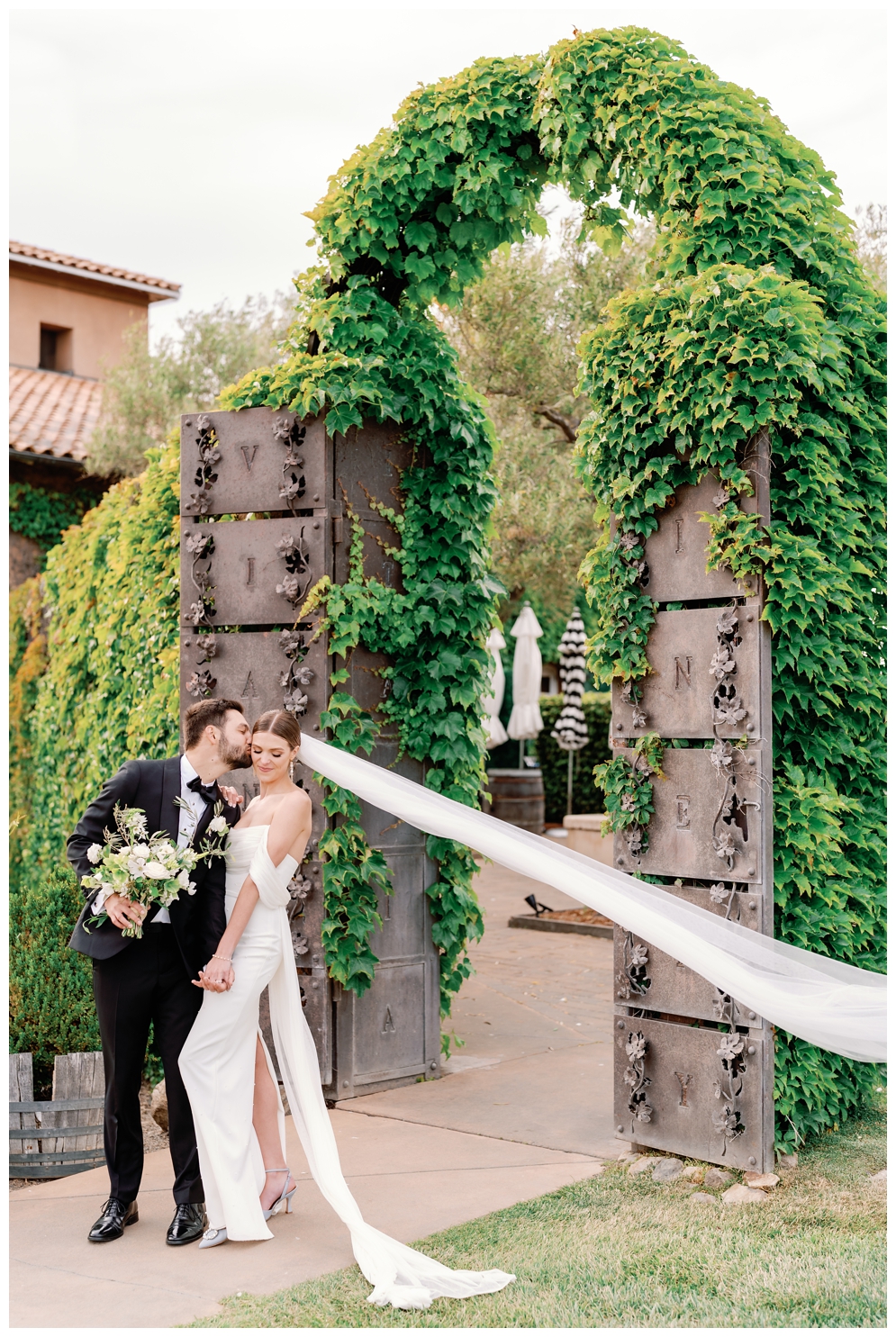 Bride and Groom in garden at Viansa Sonoma Winery Wedding